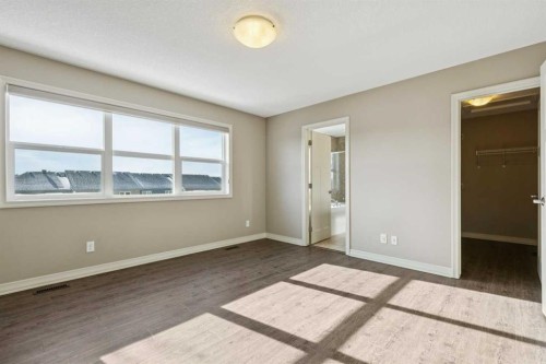 33 Sundown Grove, Cochrane, AB - Indoor Photo Showing Other Room