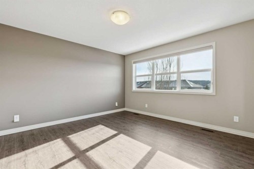 33 Sundown Grove, Cochrane, AB - Indoor Photo Showing Other Room