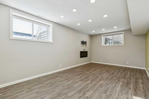 33 Sundown Grove, Cochrane, AB - Indoor Photo Showing Other Room