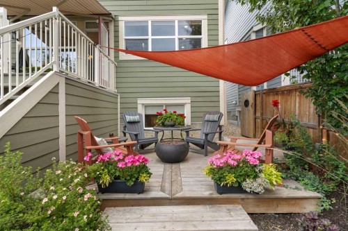 33 Sundown Grove, Cochrane, AB - Outdoor With Deck Patio Veranda With Exterior