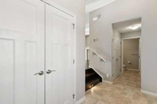 33 Sundown Grove, Cochrane, AB - Indoor Photo Showing Other Room