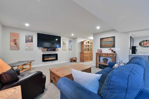 6427 Lombardy Crescent Sw, Calgary, AB - Indoor With Fireplace