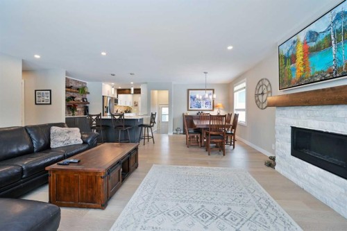 6427 Lombardy Crescent Sw, Calgary, AB - Indoor Photo Showing Living Room With Fireplace