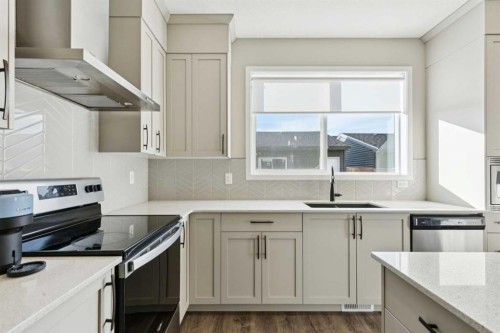 129 Dawson Drive, Chestermere, AB - Indoor Photo Showing Kitchen With Stainless Steel Kitchen With Upgraded Kitchen