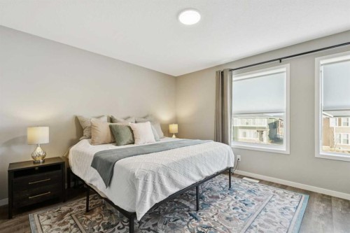 129 Dawson Drive, Chestermere, AB - Indoor Photo Showing Bedroom