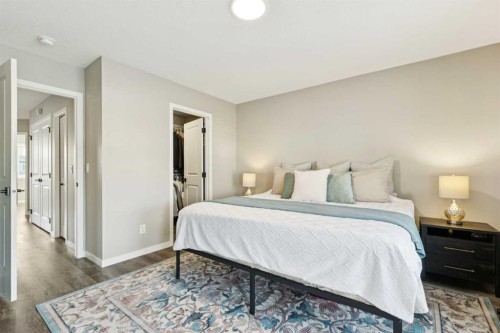 129 Dawson Drive, Chestermere, AB - Indoor Photo Showing Bedroom