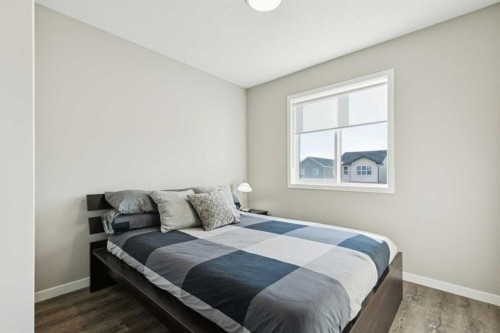 129 Dawson Drive, Chestermere, AB - Indoor Photo Showing Bedroom