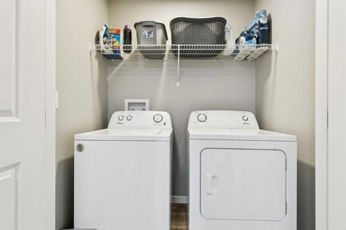 129 Dawson Drive, Chestermere, AB - Indoor Photo Showing Laundry Room