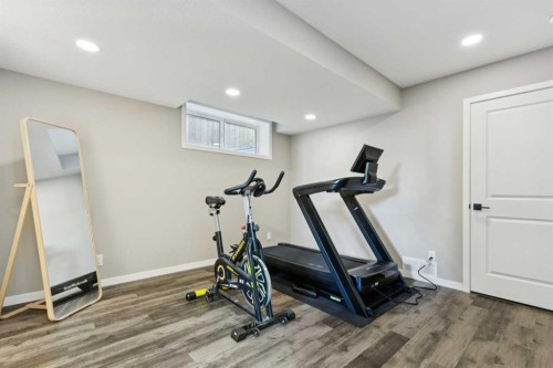 129 Dawson Drive, Chestermere, AB - Indoor Photo Showing Gym Room