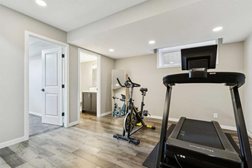 129 Dawson Drive, Chestermere, AB - Indoor Photo Showing Gym Room