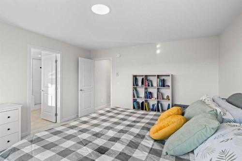 35 Cranbrook Mount Se, Calgary, AB - Indoor Photo Showing Bedroom