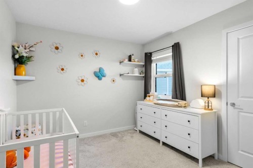 35 Cranbrook Mount Se, Calgary, AB - Indoor Photo Showing Bedroom