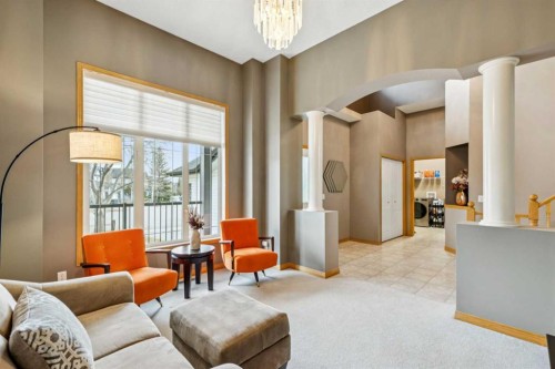 232 Springmere Place, Chestermere, AB - Indoor Photo Showing Living Room