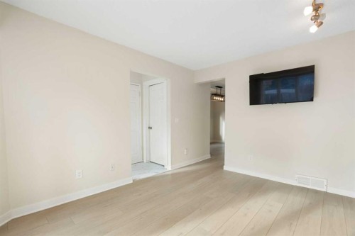 25 Mckernan Road Se, Calgary, AB - Indoor Photo Showing Other Room