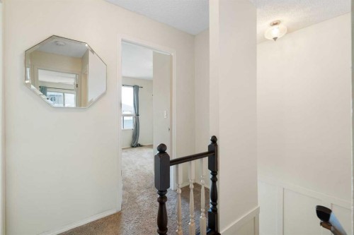 25 Mckernan Road Se, Calgary, AB - Indoor Photo Showing Other Room