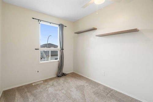 25 Mckernan Road Se, Calgary, AB - Indoor Photo Showing Other Room