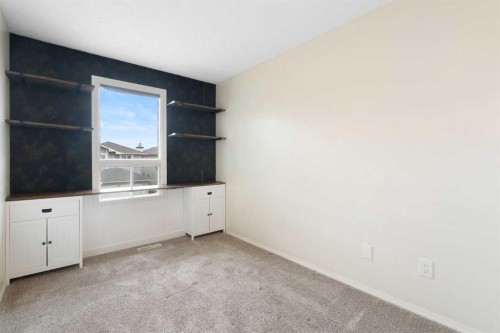 25 Mckernan Road Se, Calgary, AB - Indoor Photo Showing Other Room