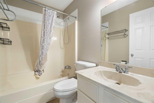 25 Mckernan Road Se, Calgary, AB - Indoor Photo Showing Bathroom