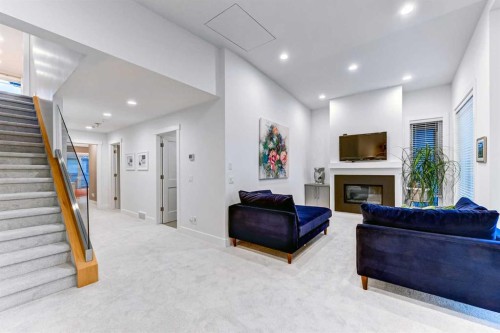 116 34A Street Nw, Calgary, AB - Indoor With Fireplace