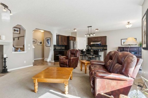 645 Panatella Boulevard Nw, Calgary, AB - Indoor Photo Showing Living Room