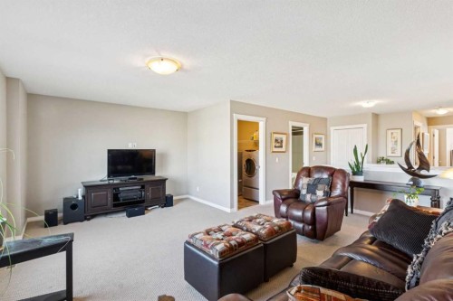 645 Panatella Boulevard Nw, Calgary, AB - Indoor Photo Showing Living Room