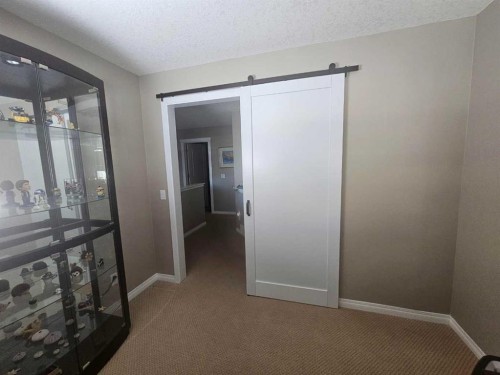 645 Panatella Boulevard Nw, Calgary, AB - Indoor Photo Showing Other Room