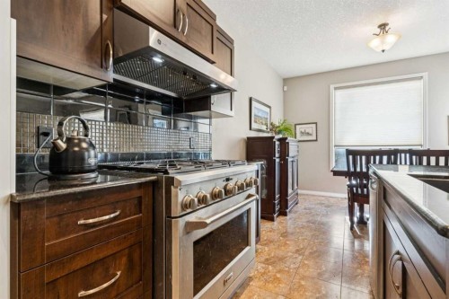 645 Panatella Boulevard Nw, Calgary, AB - Indoor Photo Showing Kitchen