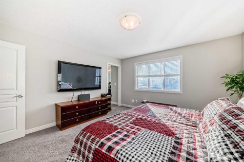 57 Silverado Skies Way Sw, Calgary, AB - Indoor Photo Showing Bedroom