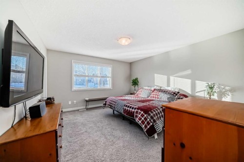 57 Silverado Skies Way Sw, Calgary, AB - Indoor Photo Showing Bedroom
