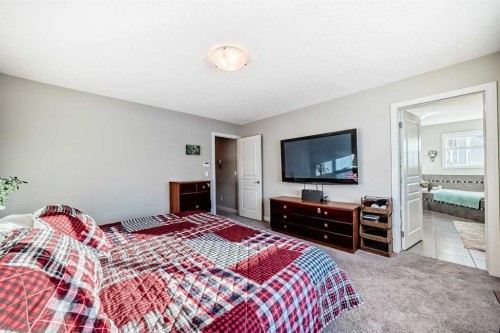 57 Silverado Skies Way Sw, Calgary, AB - Indoor Photo Showing Bedroom