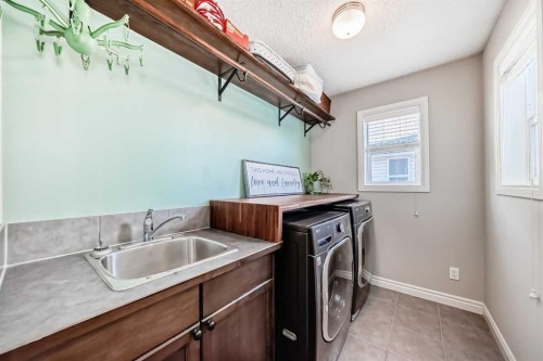 57 Silverado Skies Way Sw, Calgary, AB - Indoor Photo Showing Laundry Room