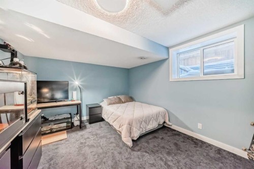 57 Silverado Skies Way Sw, Calgary, AB - Indoor Photo Showing Bedroom