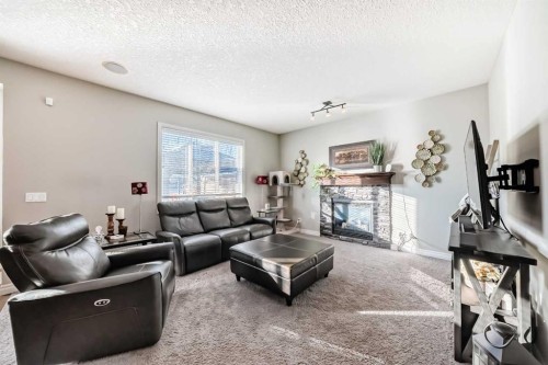 57 Silverado Skies Way Sw, Calgary, AB - Indoor Photo Showing Living Room