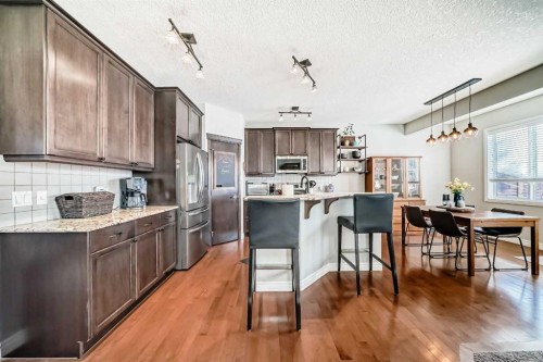 57 Silverado Skies Way Sw, Calgary, AB - Indoor Photo Showing Kitchen With Upgraded Kitchen