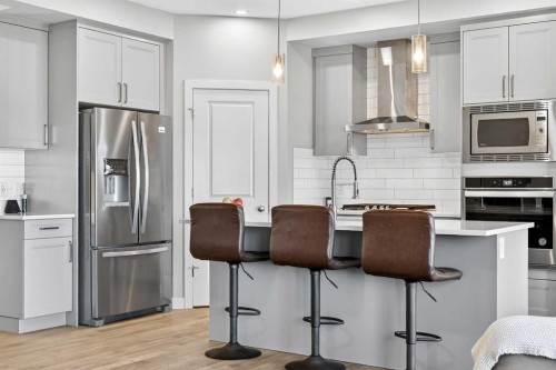 77 Belvedere Drive Se, Calgary, AB - Indoor Photo Showing Kitchen With Upgraded Kitchen