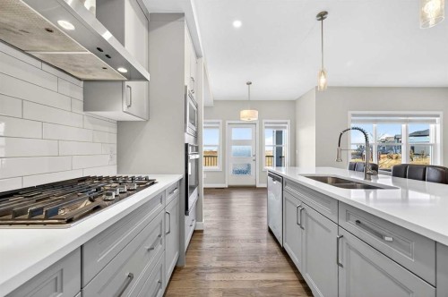 77 Belvedere Drive Se, Calgary, AB - Indoor Photo Showing Kitchen With Double Sink With Upgraded Kitchen