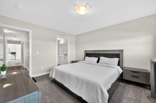 77 Belvedere Drive Se, Calgary, AB - Indoor Photo Showing Bedroom