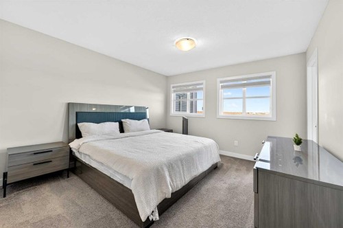 77 Belvedere Drive Se, Calgary, AB - Indoor Photo Showing Bedroom
