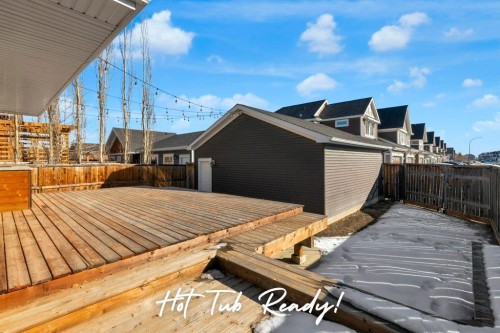 207 River Heights Crescent, Cochrane, AB - Outdoor With Deck Patio Veranda With Exterior