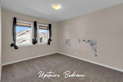 207 River Heights Crescent, Cochrane, AB - Indoor Photo Showing Other Room