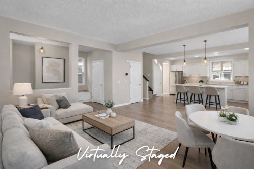 207 River Heights Crescent, Cochrane, AB - Indoor Photo Showing Living Room