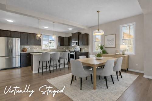207 River Heights Crescent, Cochrane, AB - Indoor Photo Showing Dining Room