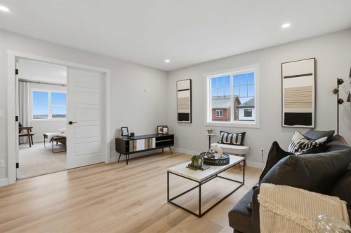 64 Buffaloberry Manor Se, Calgary, AB - Indoor Photo Showing Living Room