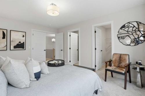 64 Buffaloberry Manor Se, Calgary, AB - Indoor Photo Showing Bedroom