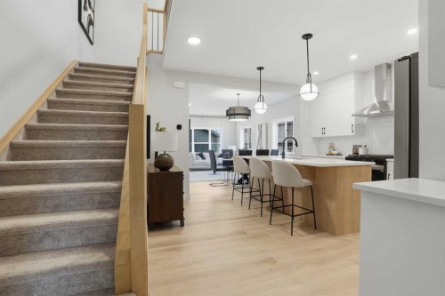 64 Buffaloberry Manor Se, Calgary, AB - Indoor Photo Showing Kitchen With Upgraded Kitchen