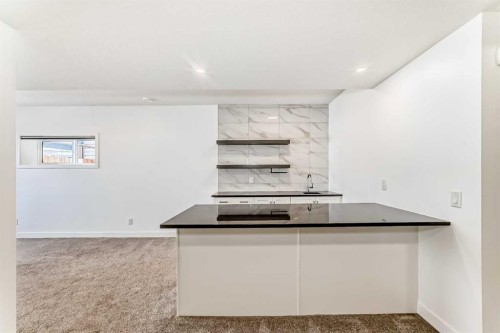 63 Riviera Court, Cochrane, AB - Indoor Photo Showing Other Room