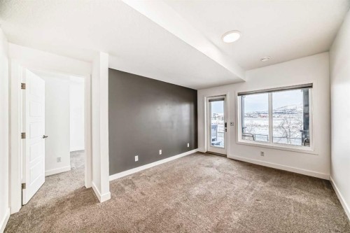 63 Riviera Court, Cochrane, AB - Indoor Photo Showing Other Room