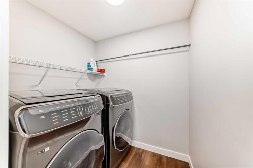 63 Riviera Court, Cochrane, AB - Indoor Photo Showing Laundry Room