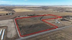 23.26 ACRES ALONG 48 Street EAST Rural Foothills County, AB T1V 1M3