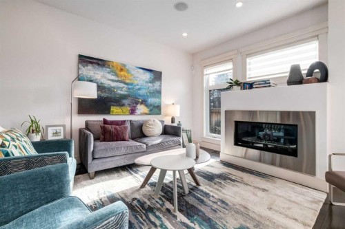 2613 3 Avenue Nw, Calgary, AB - Indoor Photo Showing Living Room With Fireplace